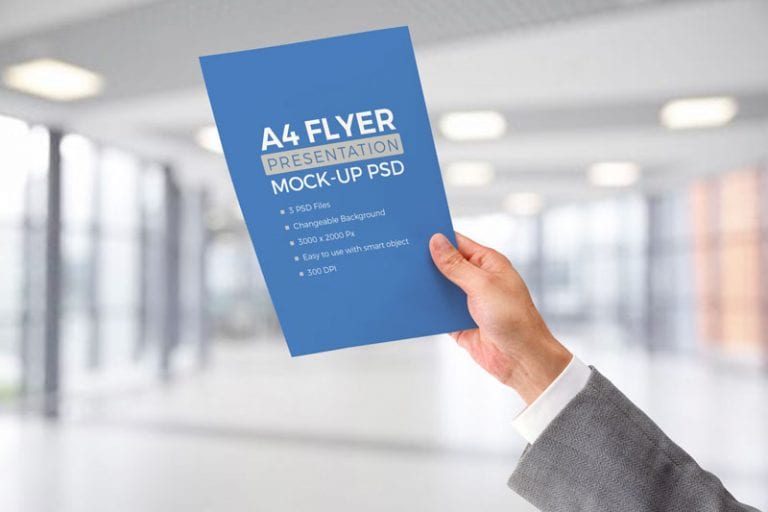 Download A4 Flyer In Male Hand Free Mockup Freemockup