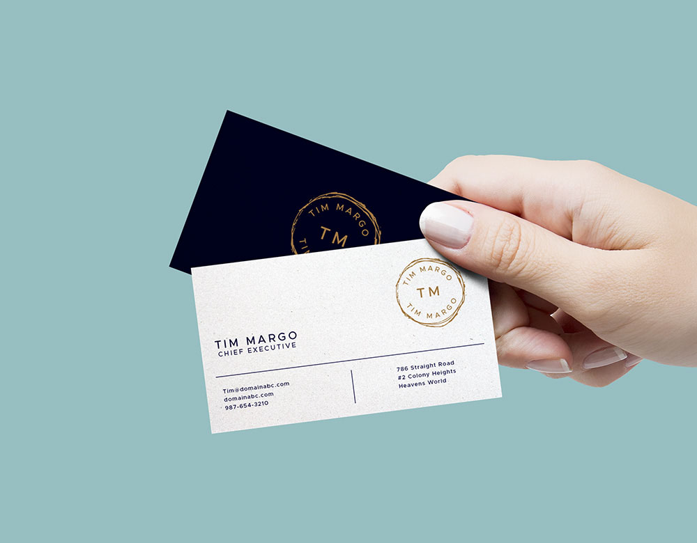 Hand Holding Business Cards Free Mockup
