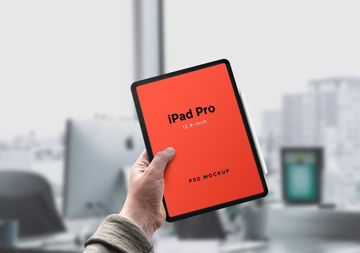 iPad Pro in Man’s Hand Free Mockup