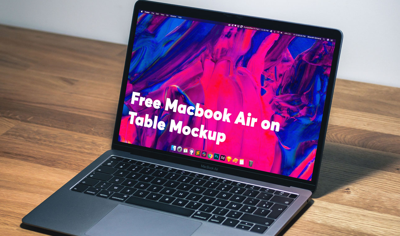 Free MacBook Air on Table Mockup