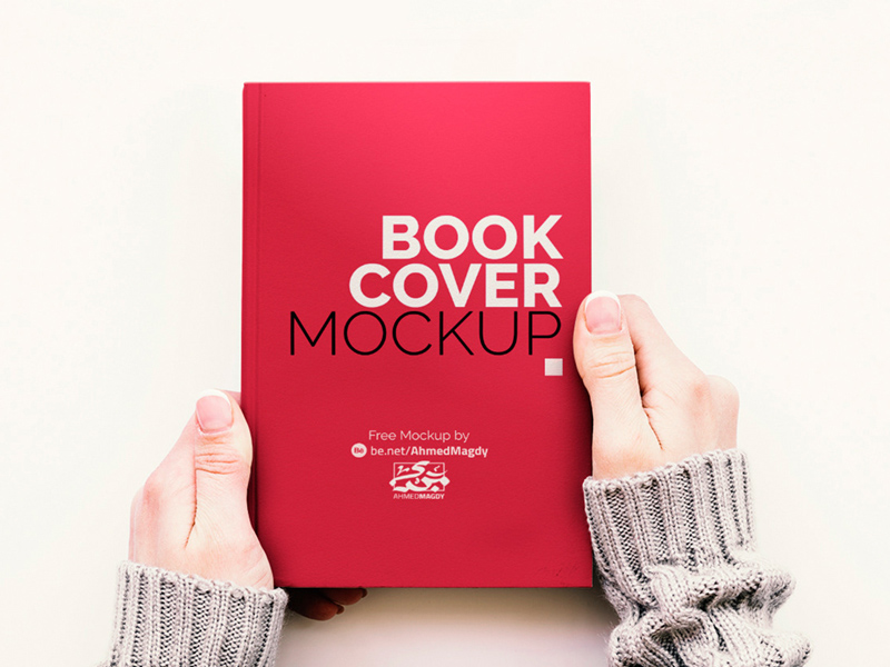 Hand Held Book Cover Free Mockup