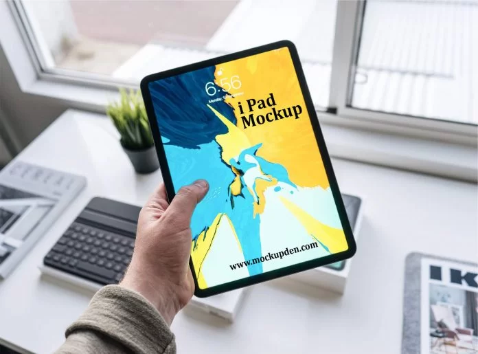 Man Using iPad Free PSD Mockup Template