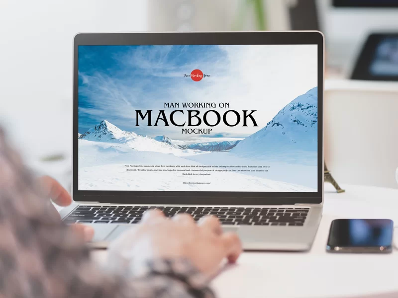 Man Working on MacBook Free PSD Mockup