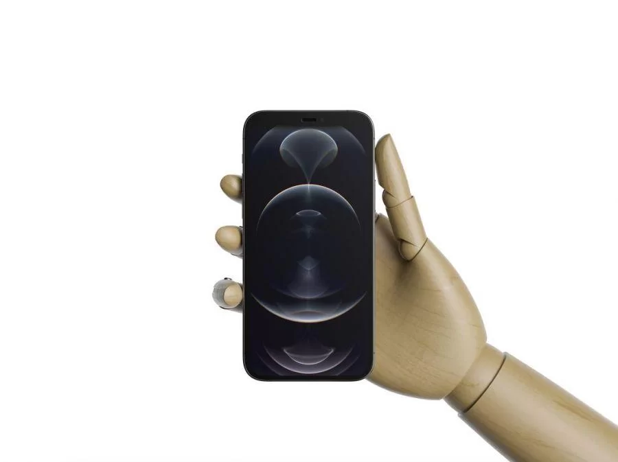 Wooden Hand Holding iPhone 12 Pro Free Mockup