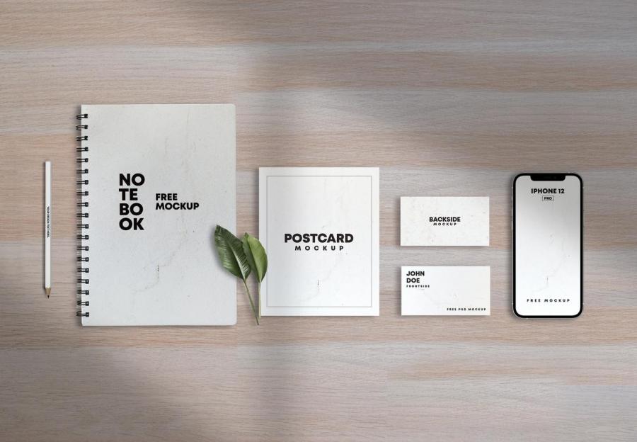 Notebook with Papers & iPhone 12 Free Mockup