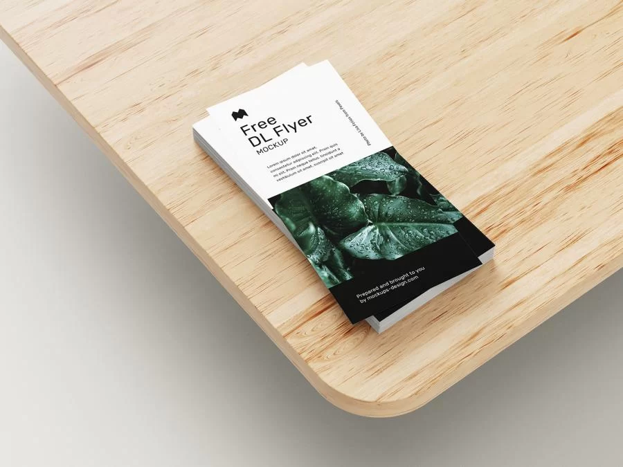 DL Flyer on Wooden Table Free Mockup Set
