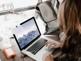 A Person Working On A Macbook Pro Free Mockup