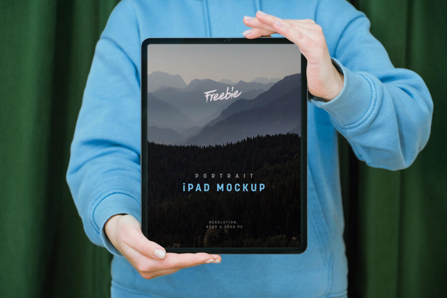 Free Hand Holding iPad Pro Mockup