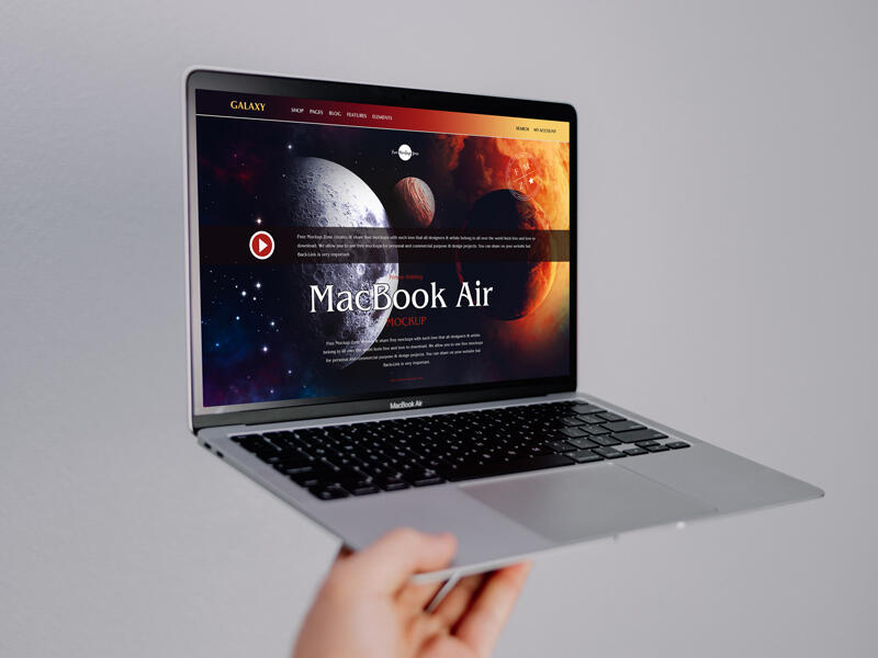 Person Holding MacBook Air Free Mockup