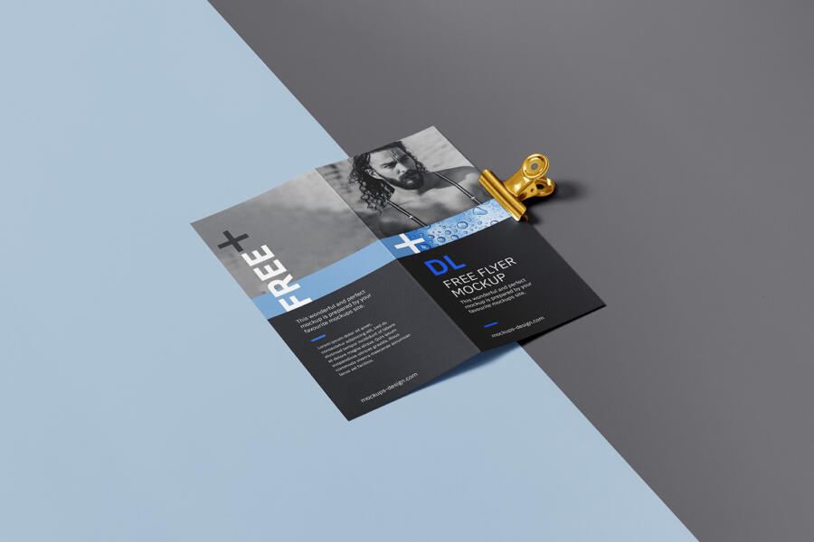 Bi fold DL Flyer with a clip Free Mockup