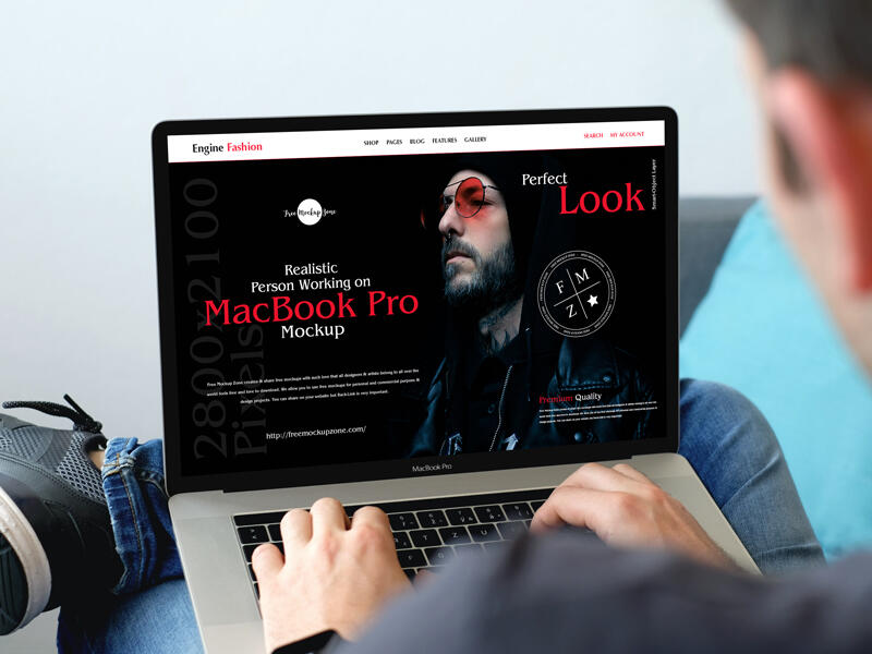 Realistic Person Working on MacBook Pro Free Mockup