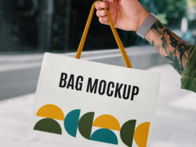 Hand Holding Mini Shopping Bag Free Mockup