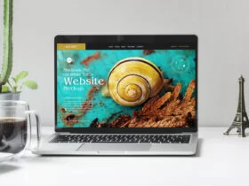 Free MacBook Pro on White Table Website Mockup